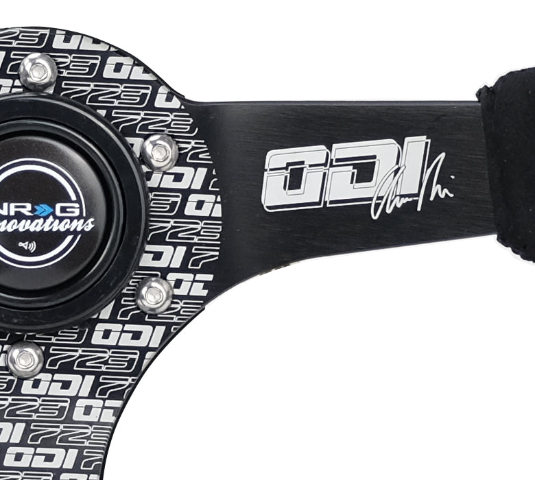 NRG Innovations - Reinforced Series Steering Wheel - Odi Bakchis Signature Edition - Black Alcantara w/Black Stitching - Printed Black Solid Spokes - NextGen Tuning